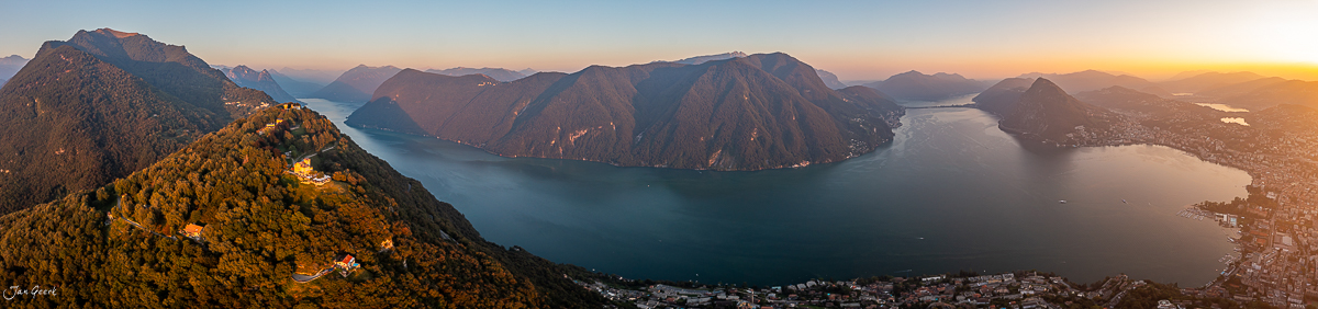Luftaufnahme Lugano mit Seen und Bergen bei Sonnenaufgang, Tessin Schweiz – Jan Geerk Fotograf Basel